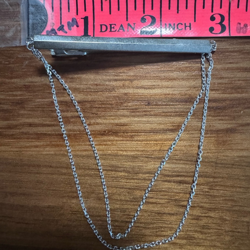 Vintage Lionstar Tie Bar with two looped chains.